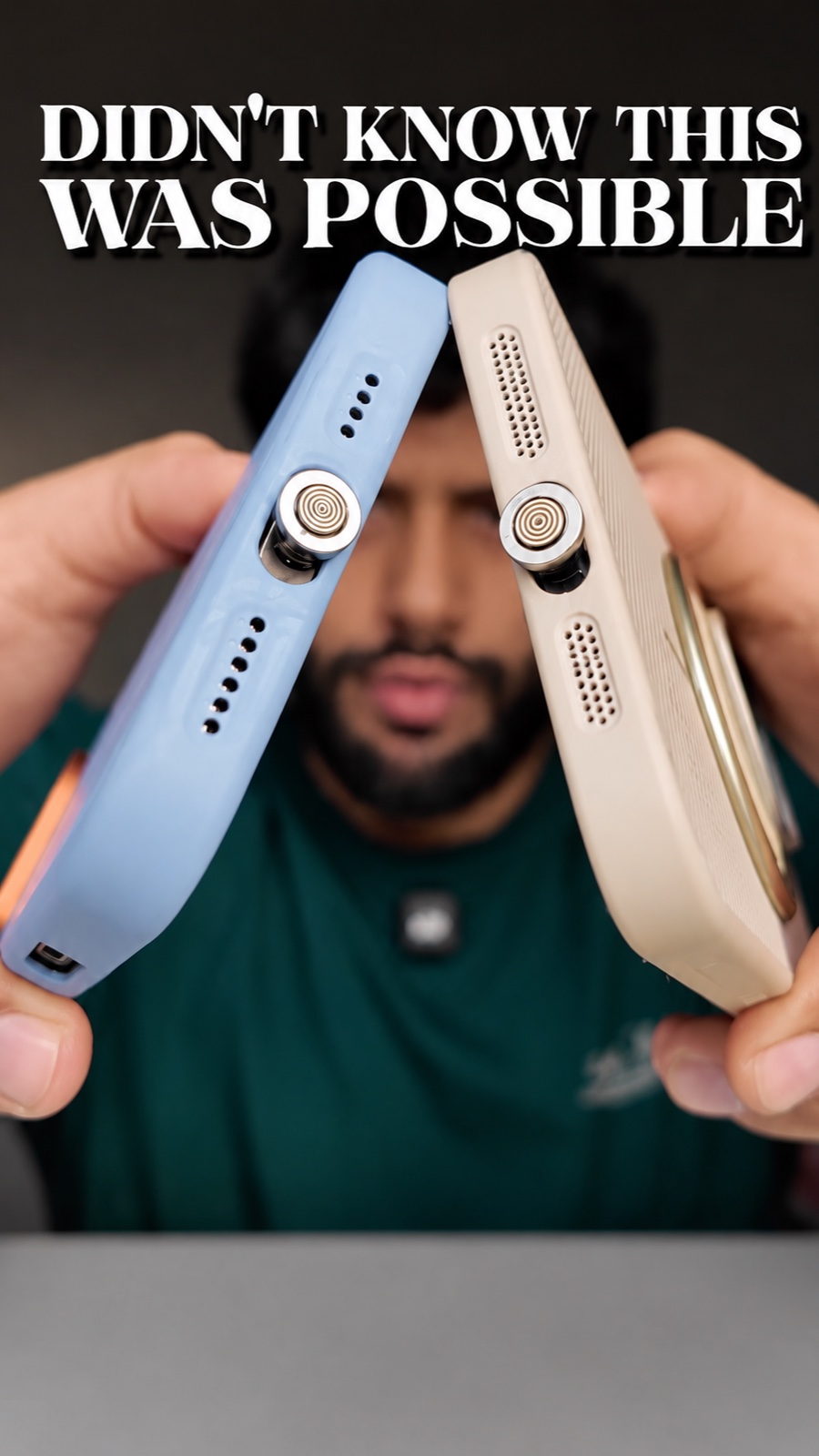 Two phone cases with magnetic charging connectors held side by side